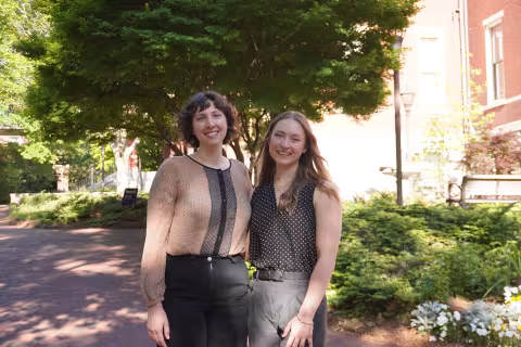 Assistant Director, Prestigious Fellowships Georgia Brunner and 2026 Truman Scholar Taylor Witte stand outside Tech Tower.